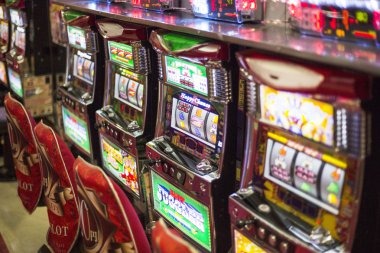 okekode mobile app interface showing slot games and live-dealer options